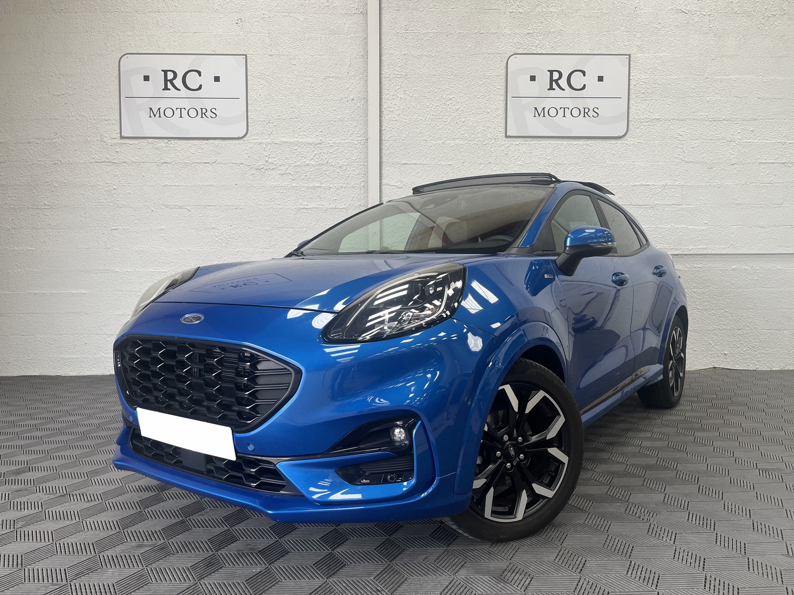 voiture occasion bordeaux rc motors ford puma st line x mhev 125 bleu island 1